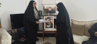 دیدار جمعی از کارکنان آموزشکده قدسیه ساری با خانواده شهید در هفته دفاع مقدس 4